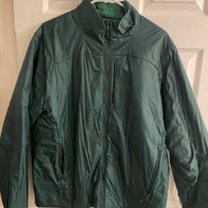 REI co-op lightweight green puffer jacket. Minimally worn. No signs of wear.